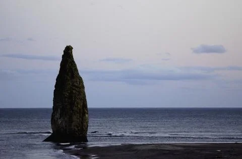 Rocks of the island of Kunashir. Stock Photos