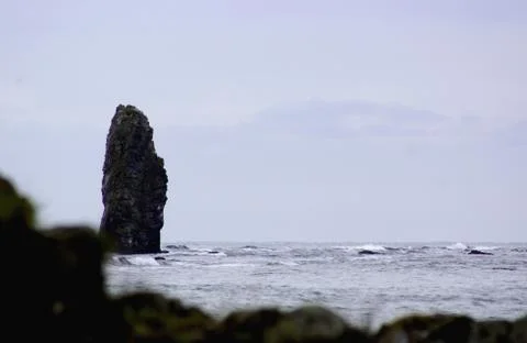 Rocks of the island of Kunashir. Stock Photos