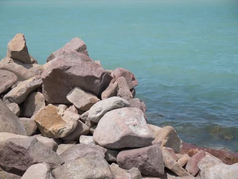 Rocks in the lake of coast Stock Photos