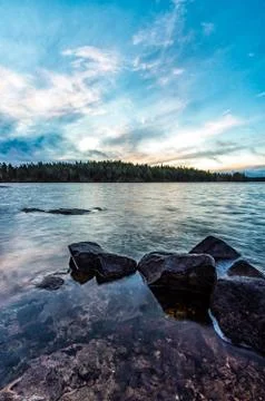 Rocks in lake Stock Photos