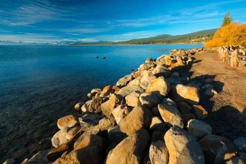 Rocks at the lakeside Stock Photos