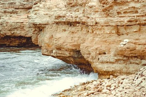 Rocks ledges by the sea Stock Photos