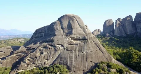 Rocks in Meteora range with surrounding cultivated land Stock Footage 107938255