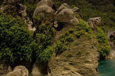 Rocks in the middle of river Stock Photos