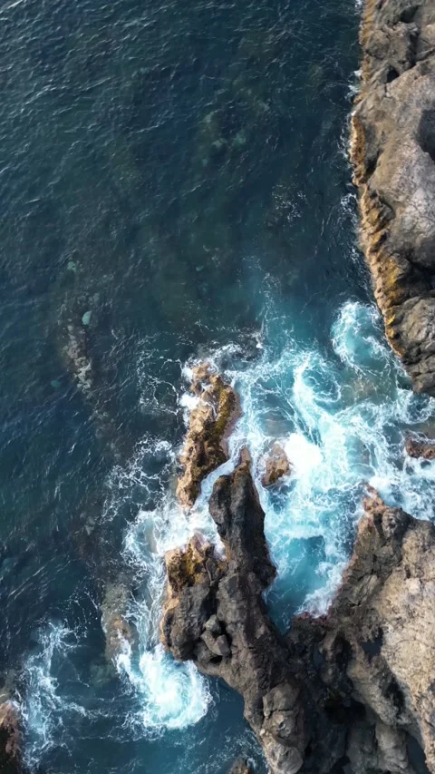 Rocks Ocean and Waves Drone Shot Footage 4K Vertical Stock Footage 233222439
