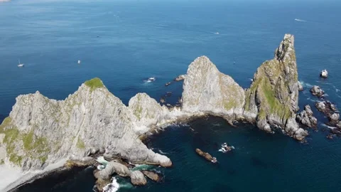 Rocks in the ocean on the coast of Kamchatka Stock Footage 168079015