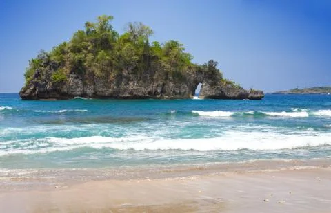Rocks in ocean, Indonesia Stock Photos