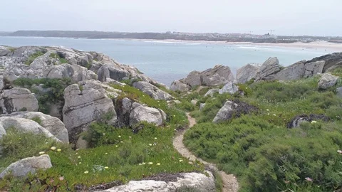 Rocks Into Ocean View Aerial 4k Stock Footage 77277015