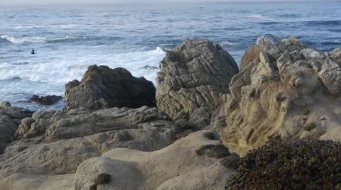 Rocks with Ocean Waves Behind Stock Footage 46559939