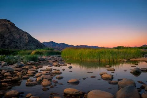 Rocks in orange river Stock Photos