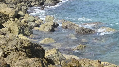Rocks in the sea Видео 115205058