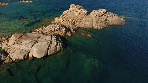 Rocks sea mediterranean view by drone aerial intelligent fly poin of interest Stock Footage 99340149
