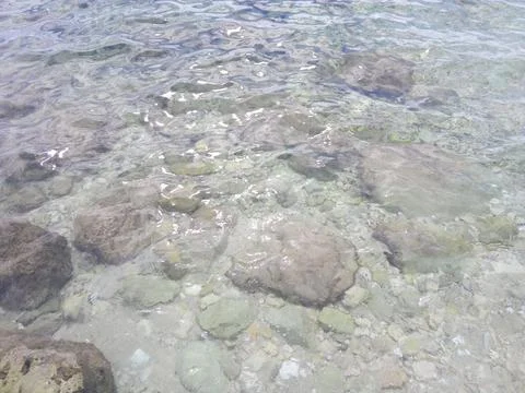Rocks in the Sea Scene Stock Photos