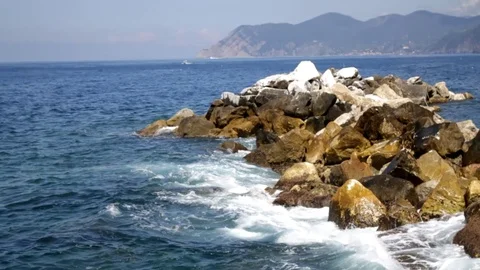 Rocks in the sea surrounded by water Stock Footage 92210897