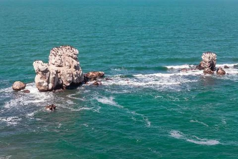 Rocks in the sea water Stock Photos