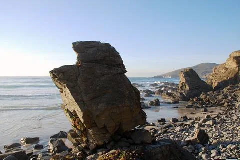Rocks on the seashore on the beach Stock Photos