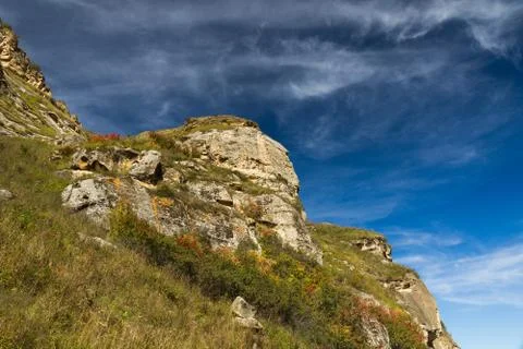 Rocks sky clouds Stock Photos