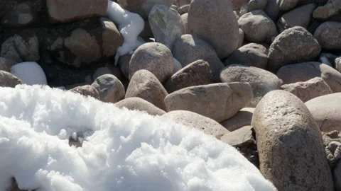 Rocks in the snow. Spring is coming Stock Footage 149608506