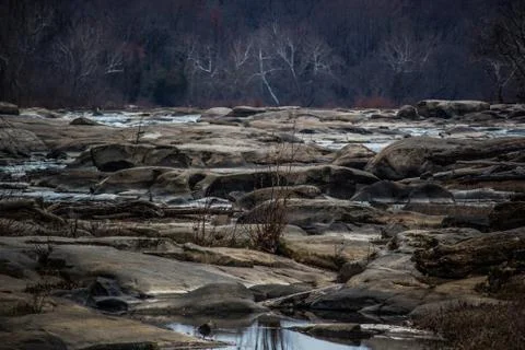 Rocks with stream and trees Stock Photos