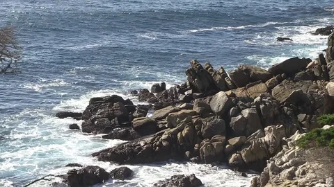 Rocks surf med2 Stock Footage 77011080