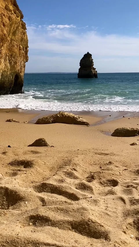 Rocks at surfer beach Praia do Castelejo near Sagres Stock Footage 238543401