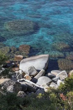 Rocks in the Turquoise Lake Stock Photos