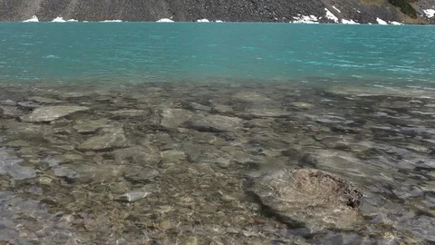 Rocks under a clear Alberta river Stock Footage 90833914