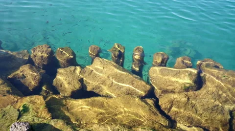 Rocks under rippling water background 4k 動画素材 49321605