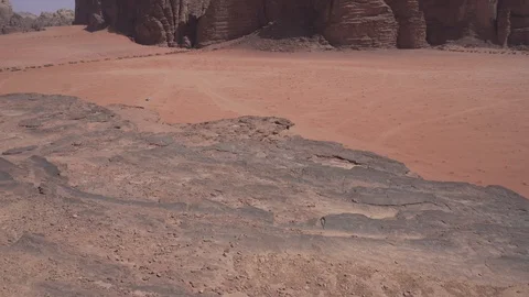 The rocks of the Wadi Rum desert in the rays of the setting sun Stock Footage 125847970