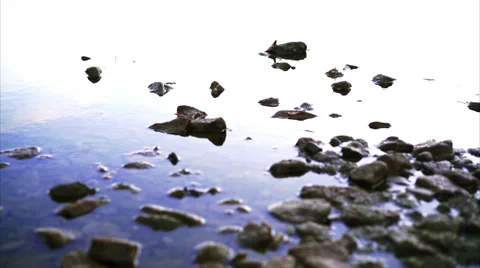 Rocks in water gradient gently moving Stock Footage 57241168