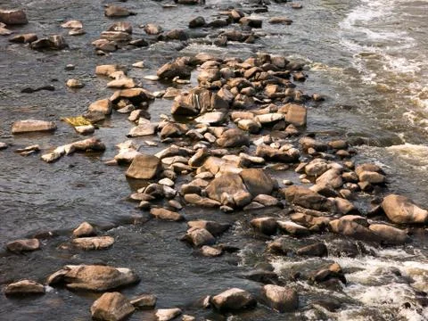 Rocks on water Stock Photos