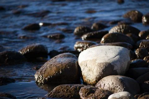 Rocks by Water Stock Photos