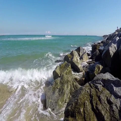 Rocks Of The Wavebreaker In The Sea Stock Footage 69437505