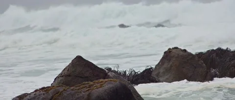Rocks waves in beach, steady shot Stock Footage 212460800