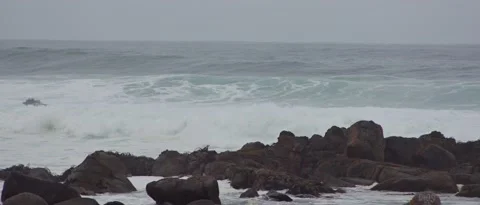 Rocks waves in beach, steady shot Stock Footage 212460813