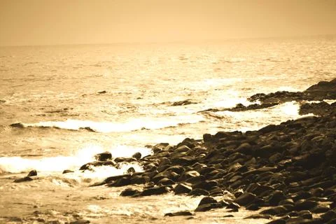 Rocks waves crashing Stock Photos