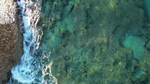 Rocky area in front of Cala Comte beach at sunset. Stock Footage 256166971