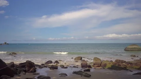 Rocky beach background against tiny cloud sky Stock-Footage 145177334