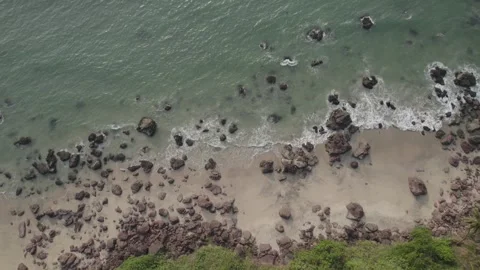 Rocky beach with floating waves done view 2 Video stock 245840247