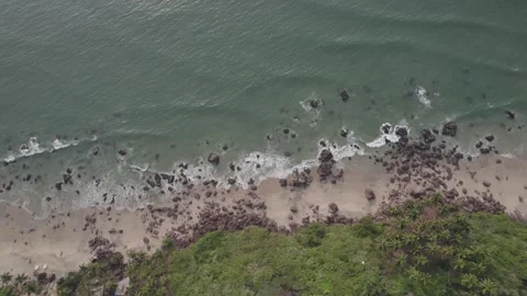 Rocky beach with floating waves done view 3 Video stock 245840344