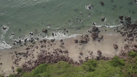 Rocky beach with floating waves done view Video stock 245840379