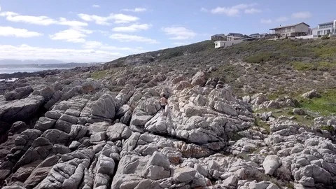 Rocky Beach - Man on Rocks Stock Footage 97175480