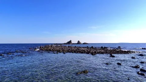 Rocky Beach at Manazuru Cape Looking at Mitsuishi Rocks Stock Footage 329059096