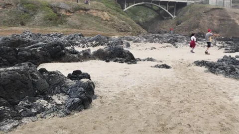 A rocky beach next to the rock 動画素材 155587793