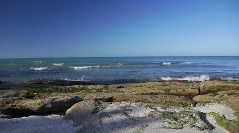 Rocky Beach on the Ocean with Glidecam Video stock 63073938