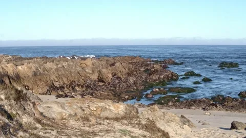 Rocky Beach With Ocean Waves Rolling In Stock Footage 154384650
