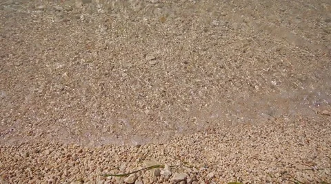 Rocky Beach Pebbles Waves Lapping Simple Water Sea Stock Footage 51258359