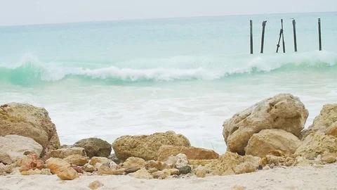 Rocky Beach Small Wave Direct Slow Motion HD Stock Footage 73554811