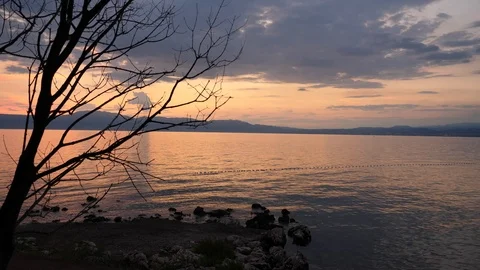 Rocky beach at sunset. Stock Footage 92598671
