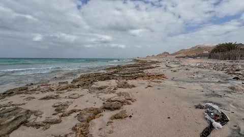 Rocky beach under cloudy sky Stock Footage 342715041